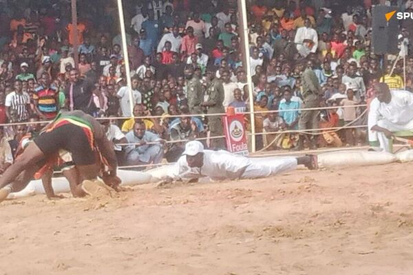 Le tournoi de lutte traditionnelle de Niamey a un nouveau héros Le tournoi de lutte traditionnelle de Niamey a un nouveau héros - Sputnik Afrique