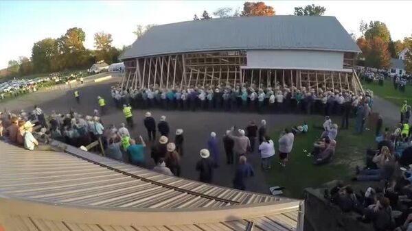 #viral | While Shanghai is moving buildings on robotic legs, in the United States, 800 Amish took a shed with their bare hands and moved it 60 meters in 30 minutes! - Sputnik Africa