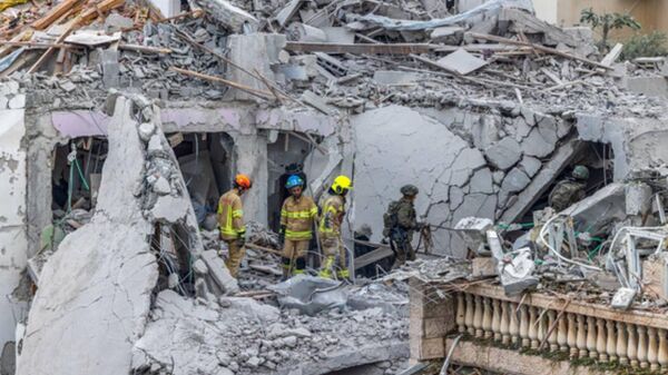 Two people killed, 19 injured, and scores of homes damaged as an Iranian missile impacted the Rishon LeZion neighborhood of Israel, the local media say - Sputnik Africa