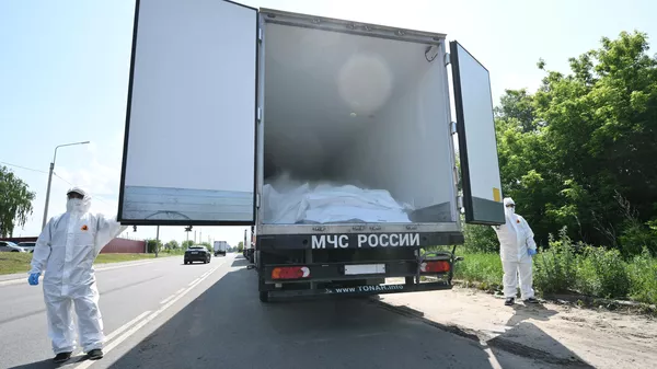 A refrigerator with the bodies of dead Ukrainian servicemen in the Bryansk region.  - Sputnik Afrique