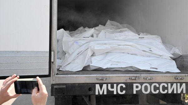 A refrigerator with the bodies of dead Ukrainian servicemen in the Bryansk region. - Sputnik Africa