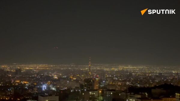 Sputnik correspondent films Iranian air defense repelling an attack on Tehran - Sputnik Africa