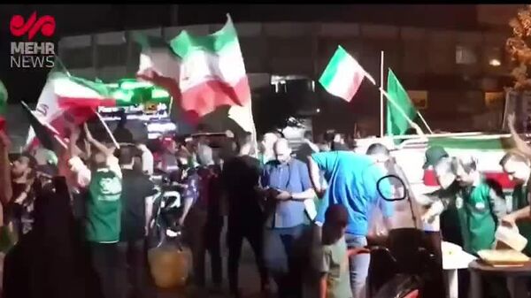 Iranians are gathering at Valiasr Square in Tehran to celebrate Iran's strikes on the US base in Qatar - Sputnik Africa