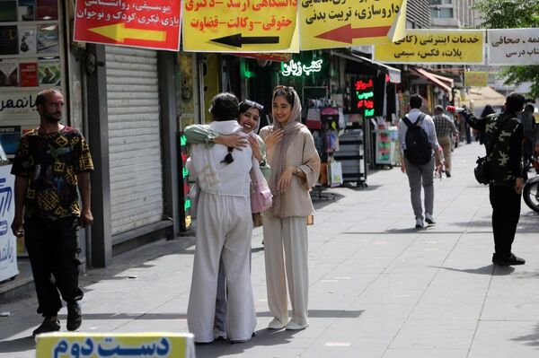 Tehran’s Heartbeat: Wounded but Unbroken Tehran’s Heartbeat: Wounded but Unbroken - Sputnik Africa