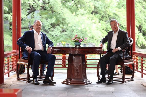 Russian FM Lavrov holds talks with his Chinese counterpart Wang Yi on the sidelines of the SCO Foreign Ministers' Meeting Russian FM Lavrov holds talks with his Chinese counterpart Wang Yi on the sidelines of the SCO Foreign Ministers' Meeting - Sputnik Africa