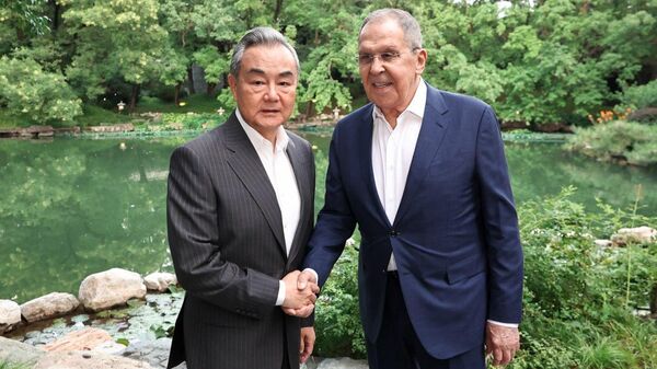 Russian FM Lavrov holds talks with his Chinese counterpart Wang Yi on the sidelines of the SCO Foreign Ministers' Meeting - Sputnik Africa