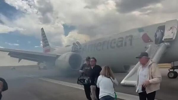 #viral | Emergency Evacuation of Passengers From a Burning Plane at Denver Airport in the US - Sputnik Africa
