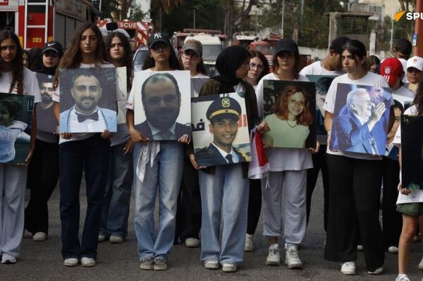 Les habitants de Beyrouth qui ont perdu leurs proches en 2020 commémorent le cinquième anniversaire de la tragédie Les habitants de Beyrouth qui ont perdu leurs proches en 2020 commémorent le cinquième anniversaire de la tragédie - Sputnik Afrique