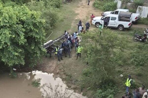 Un autocar sombre dans un cours d'eau au Bénin: un mort et 44 personnes portées disparues - Sputnik Afrique