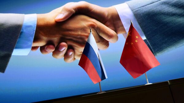  Russian and Chinese flags.File photo - Sputnik Africa