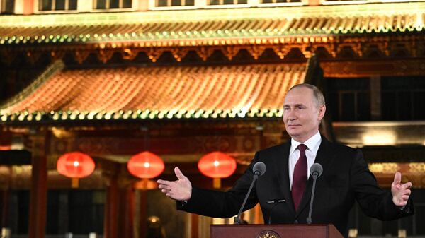 Russian President Vladimir Putin approaches media representatives at the Diaoyutai Palace in Beijing on September 3, 2025. - Sputnik Africa