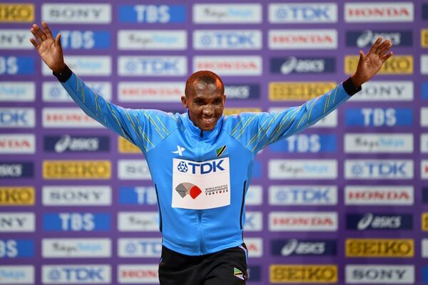 Tanzanian Sportsman Makes History, Winning Country's First Global Marathon Title in Tokyo Tanzanian Sportsman Makes History, Winning Country's First Global Marathon Title in Tokyo - Sputnik Africa