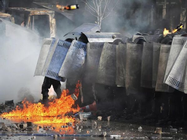 Police officers during the clashes in the center of Kiev. Police officers during the clashes in the center of Kiev. - Sputnik Africa