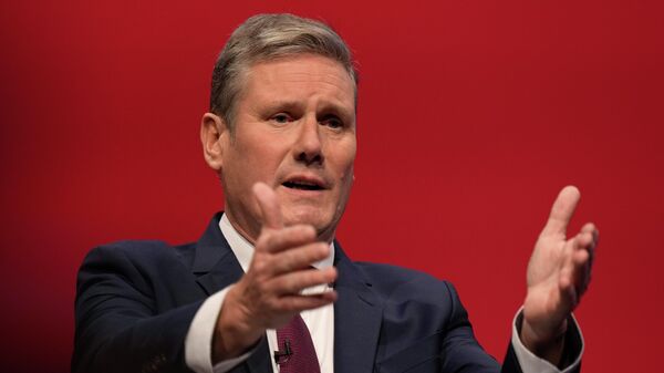 Leader of the British Labour Party Keir Starmer gestures as he makes his keynote speech at the annual party conference in Brighton, England, Sept. 29, 2021 - Sputnik Africa