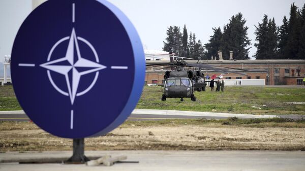 Military helicopters are parked at an airbase in Kocuve, about 85 kilometers (52 miles) south of Tirana, Albania, Monday, March 4, 2024 Military helicopters are parked at an airbase in Kocuve, about 85 kilometers (52 miles) south of Tirana, Albania, Monday, March 4, 2024 - Sputnik Afrique