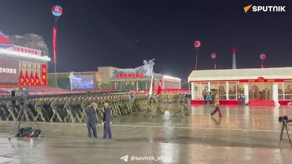 North Korean Troops March With Russian Flag - Sputnik Africa
