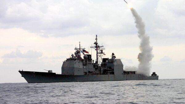 A Tomahawk Land Attack Missile (TLAM) launches from the guided missile cruiser USS Cape St. George (CG 71), in operation in the Mediterranean Sea, on March 23, 2003 - Sputnik Africa