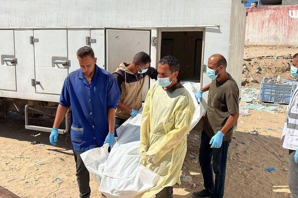 Gaza annonce avoir reçu 135 corps de Palestiniens remis par Israël Gaza annonce avoir reçu 135 corps de Palestiniens remis par Israël - Sputnik Afrique