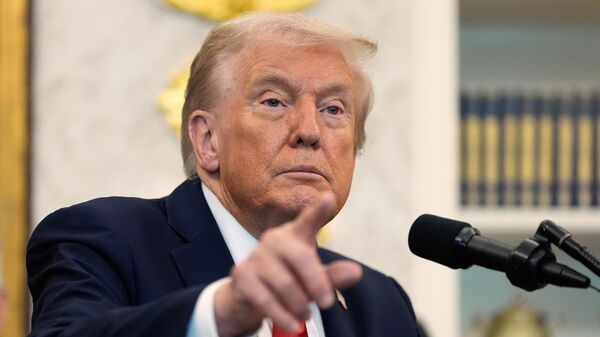 President Donald Trump speaks in the Oval Office of the White House, Thursday, Oct. 16, 2025, in Washington - Sputnik Africa
