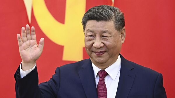 Chinese President Xi Jinping waves during a meeting with Vietnam's Communist Party General Secretary To Lam at the Office of the Party Central Committee in Hanoi Monday, April 14, 2025. - Sputnik Africa