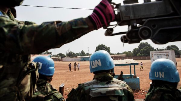 Des forces de maintien de la paix rwandaises de la MINUSCA patrouillent aux abords de Bangui, en République centrafricaine, le samedi 23 janvier 2021 (Photo AP/Adrienne Surprenant) - Sputnik Afrique