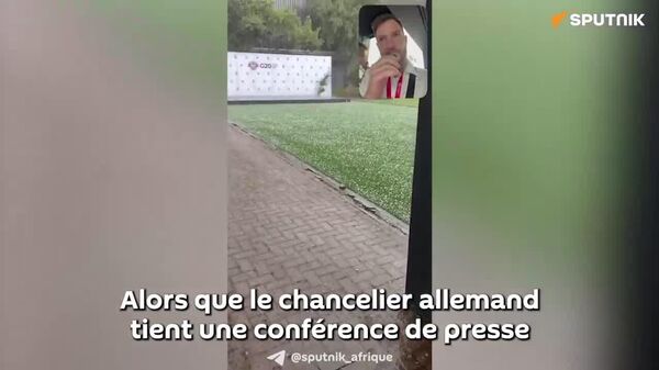 Même la météo en Afrique du Sud semble avoir son mot à dire sur le chancelier allemand… - Sputnik Afrique