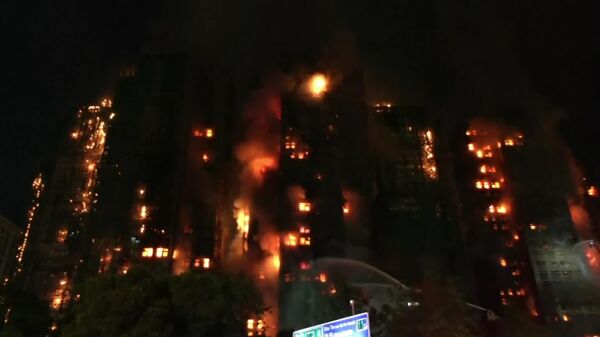 Massive fire engulfs Hong Kong high-rises, leaving at least 13 dead - Sputnik Africa