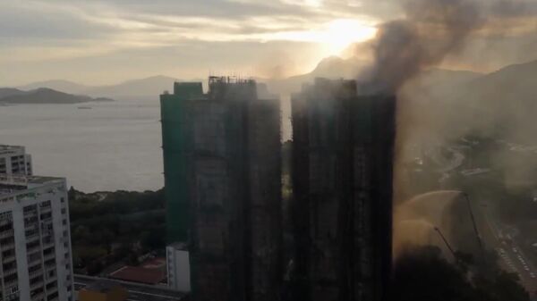 #viral | Hong Kong Skyscrapers Shrouded in Smoke After City's Largest Fire in 17 Years - Sputnik Africa
