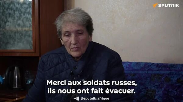 ▶ Des militaires russes ont porté des sacs de civils évacués sur 22 km - Sputnik Afrique