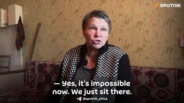 Ukrainian Militants Purposefully Attack Residents Trying to Extinguish Houses After Drone Strike in DPR: Refugee - Sputnik Africa