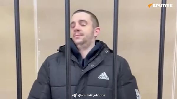 ▶ Un mercenaire britannique condamné à 13 ans de prison pour avoir combattu avec l'armée ukrainienne dans le Donbass ▶ Un mercenaire britannique condamné à 13 ans de prison pour avoir combattu avec l'armée ukrainienne dans le Donbass - Sputnik Afrique