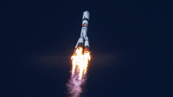 The Soyuz-2.1a rocket with the Progress MS-22 cargo spacecraft, bound for the International Space Station (ISS), blasts off a launch pad at the Baikonur Cosmodrome, Kazakhstan - Sputnik Africa