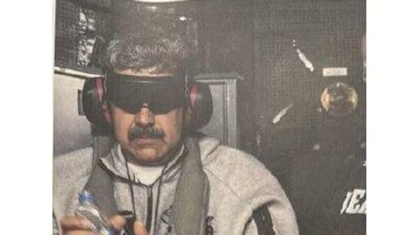 Trump Publishes Alleged Photo of Captured President Maduro - Sputnik Africa