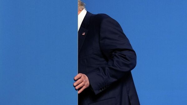 President Donald Trump leaves after a media conference at the end of the NATO summit in The Hague, Netherlands, Wednesday, June 25, 2025. - Sputnik Africa