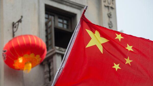 The Chinese flag on a pedestrian street on Hefang Street in Hangzhou, China. - Sputnik Africa