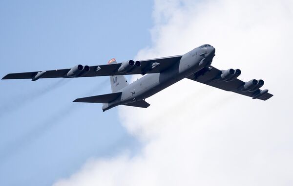 A US Air Force B-52 bomber flies over Training Range in Pabrade during a military exercise 'Iron Wolf 2016' some 60km.(38 miles) north of the capital Vilnius, Lithuania, Thursday, June 16, 2016. (AP Photo/Mindaugas Kulbis) - Sputnik Africa