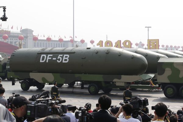 Military vehicles carrying DF-5B intercontinental ballistic missiles travel past Tiananmen Square during the military parade marking the 70th founding anniversary of People's Republic of China, on its National Day in Beijing, China October 1, 2019 - Sputnik Africa