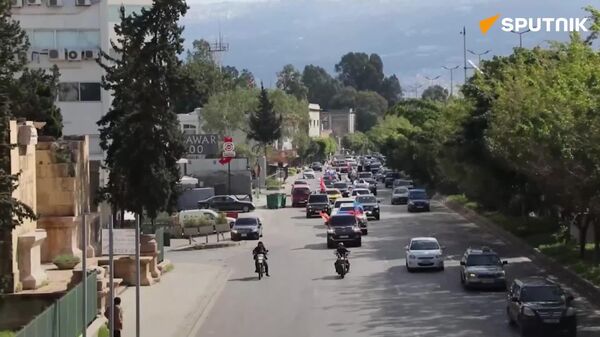 Les rues de Beyrouth se parent de drapeaux russes pour la Journée du Défenseur de la Patrie - Sputnik Afrique