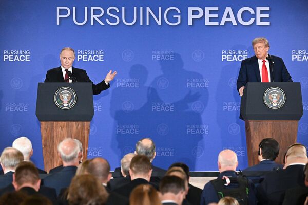 Russian President Vladimir Putin and US President Donald Trump at the press conference following their meeting in Anchorage, Alaska. August 15, 2025. - Sputnik Africa