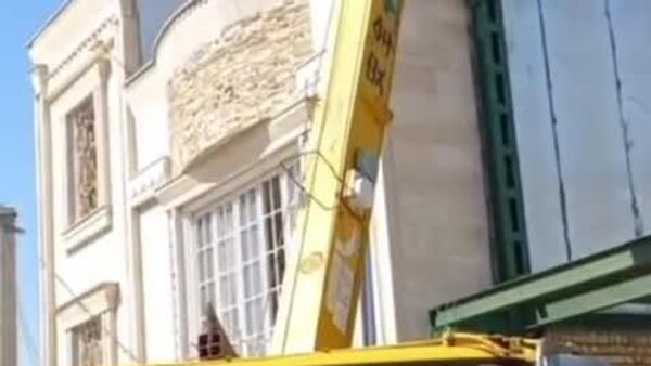 Une bombe américaine d'une tonne a été retirée d'un immeuble à Kuhdacht, en Iran - Sputnik Afrique