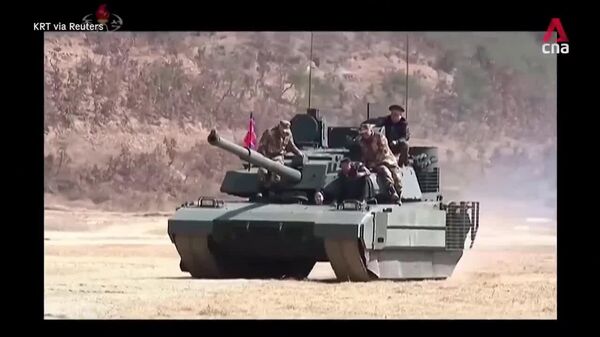 Kim Jong-un et sa fille pilotent un char d'assaut nouvelle génération lors des exercices - Sputnik Africa