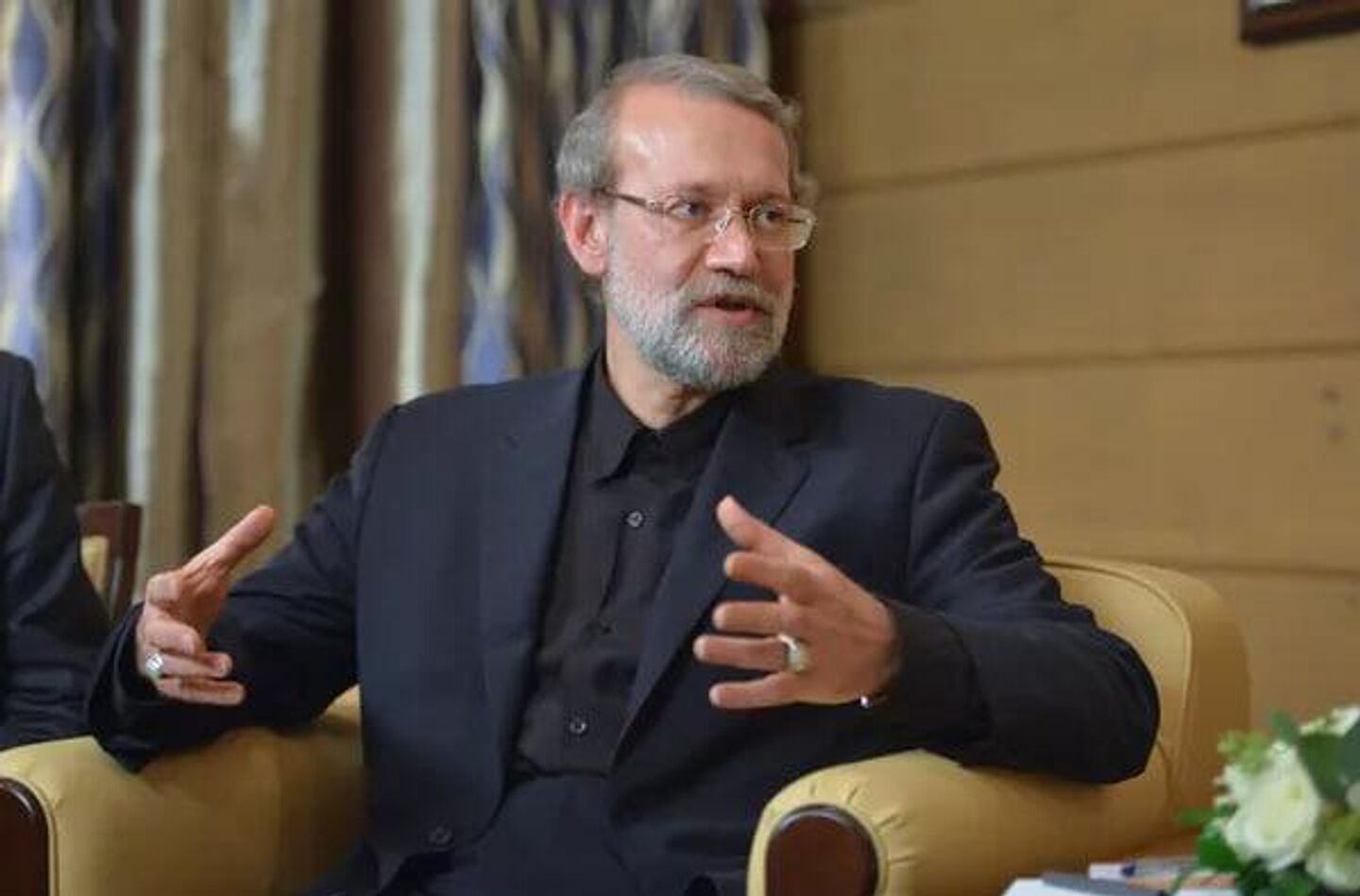 Ali Larijani, président du Conseil consultatif islamique (parlement) de la République islamique d'Iran, lors d'une rencontre avec le président russe Vladimir Poutine à l'issue de la 12e réunion annuelle du Club de discussion international Valdaï, 22 octobre 2015 - Sputnik Afrique
