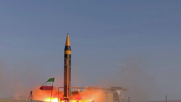 In this photo released by the Iranian Defense Ministry on May 25, 2023, Khorramshahr-4 missile is launched at an undisclosed location, Iran (Iranian Defense Ministry via AP) - Sputnik Africa