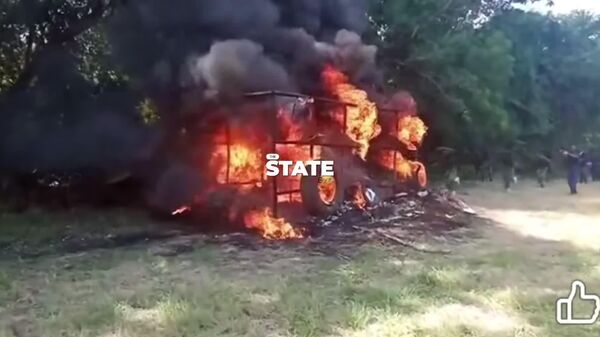 À travers le feu: les troupes ghanéennes démontrent leur aptitude au combat lors d'un exercice - Sputnik Afrique