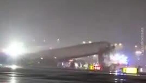 Un avion de ligne est entré en collision avec un camion de pompiers à New York - Sputnik Afrique