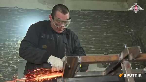 Les ateliers de réparation du groupement russe Centre fonctionnent 24h/24 - Sputnik Afrique