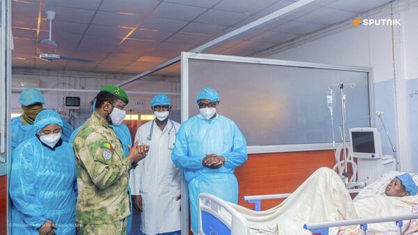 Malian President Comforts Wounded & Pays Tribute to Fallen Minister's Family - Sputnik Africa