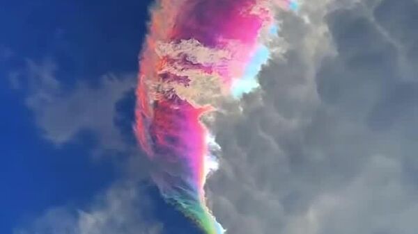 Rare Rainbow Clouds in Indonesia Mesmerize With Vibrant Colors Subscribe to - Sputnik Africa