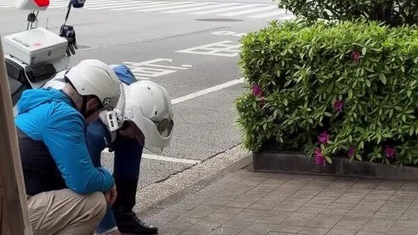 L'obstacle linguistique? Connais pas: un policier japonais use d'une craie pour expliquer une infraction - Sputnik Afrique