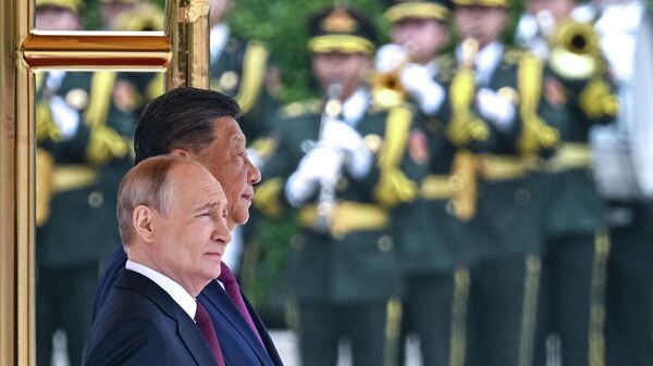 Russian President Vladimir Putin and Chinese President Xi Jinping during a meeting in Beijing on May 20, 2026. - Sputnik Africa